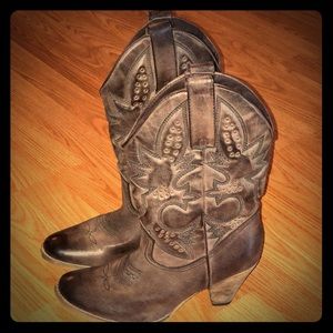 Heeled brown cowboy boots